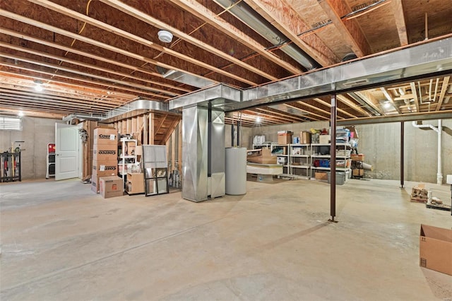unfinished below grade area with water heater and heating unit