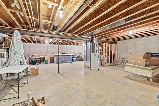 unfinished basement with electric water heater