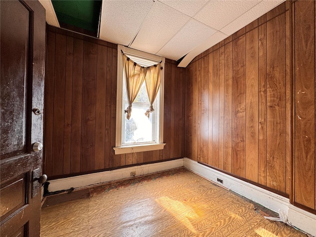 5168 Vernon Ave, Saint Louis, MO 63113 - empty room featuring wood walls