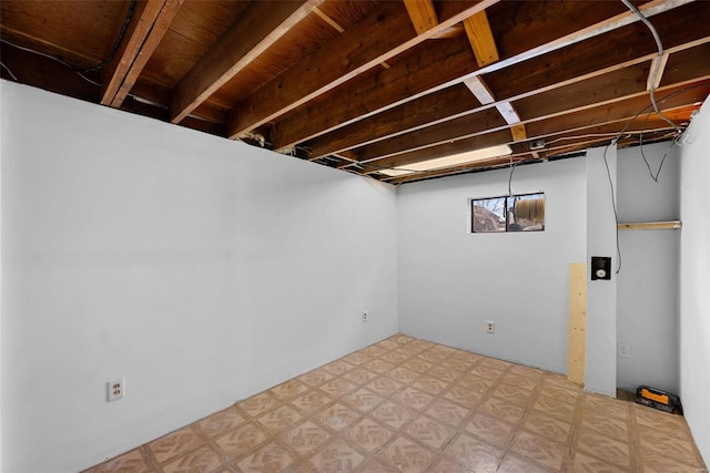 basement featuring tile patterned floors
