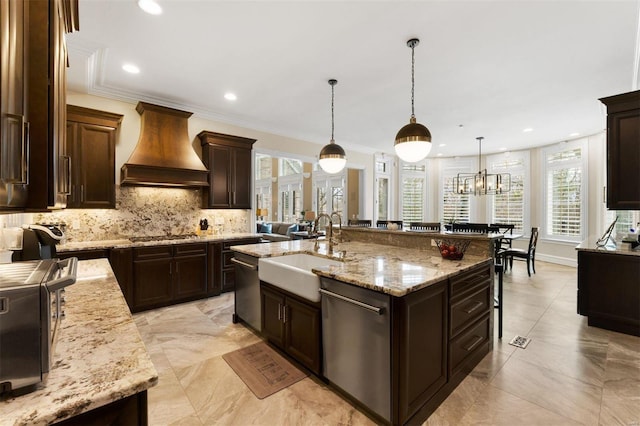 kitchen with custom range hood, appliances with stainless steel finishes, backsplash, crown molding, and a sink