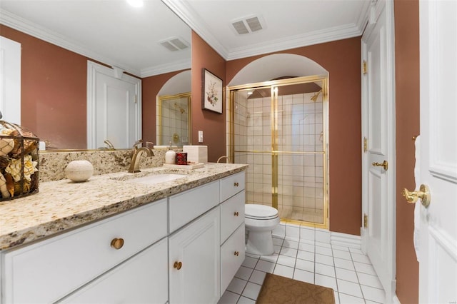 full bath with a shower stall, tile patterned flooring, toilet, crown molding, and vanity