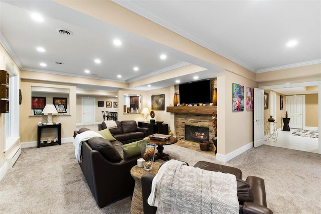 living area with light colored carpet, ornamental molding, baseboards, a stone fireplace, and recessed lighting