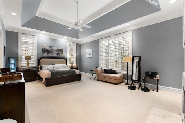 bedroom with carpet flooring, baseboards, a tray ceiling, crown molding, and recessed lighting