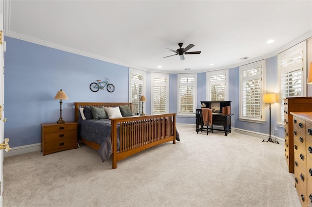 carpeted bedroom featuring ornamental molding, baseboards, recessed lighting, and a ceiling fan