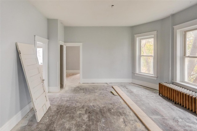 124 Carlyle Ave, Belleville, IL 62220 - unfurnished room featuring radiator heating unit and baseboards