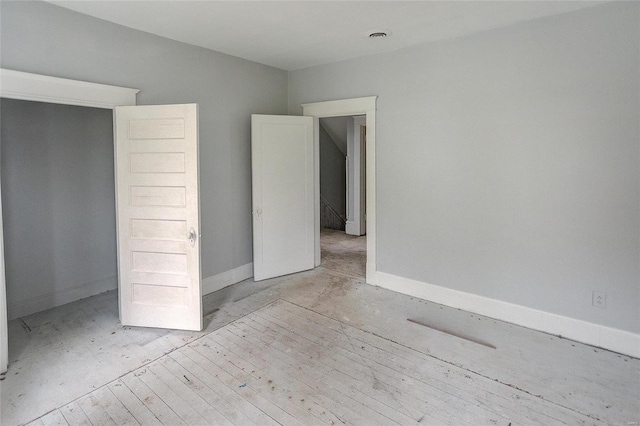124 Carlyle Ave, Belleville, IL 62220 - unfurnished bedroom featuring baseboards