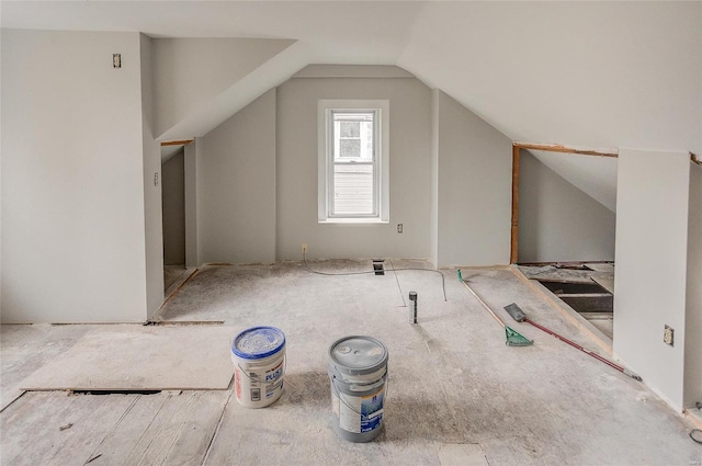 bonus room featuring vaulted ceiling