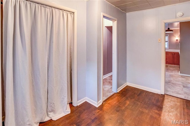 219 Highland St, Carrollton, IL 62016 - bathroom featuring wood finished floors and baseboards
