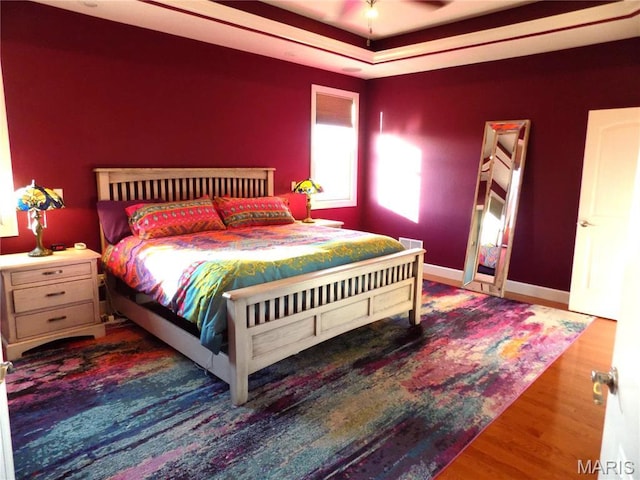 13185 Jenna Ln, Rolla, MO 65401 - bedroom featuring wood finished floors and baseboards