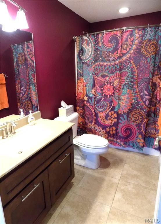 13185 Jenna Ln, Rolla, MO 65401 - full bathroom with tile patterned flooring, toilet, vanity, and a shower with shower curtain