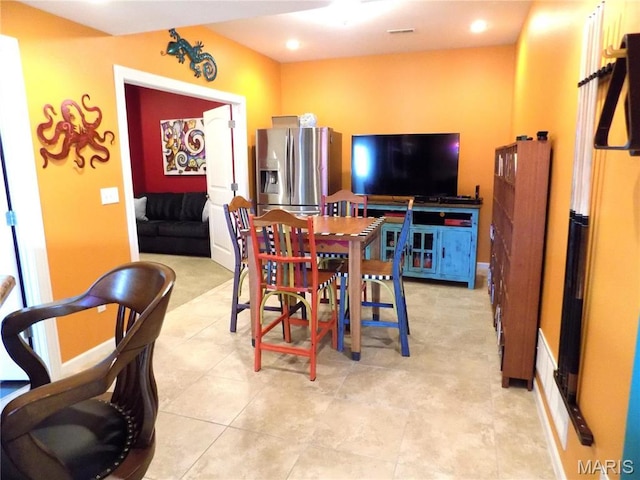13185 Jenna Ln, Rolla, MO 65401 - dining space featuring light tile patterned flooring