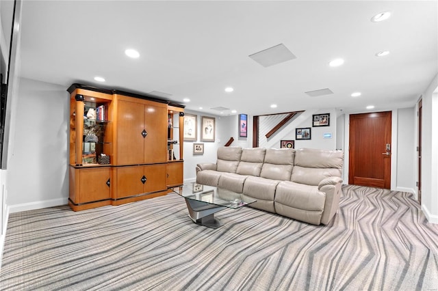 living room with light colored carpet, baseboards, and recessed lighting