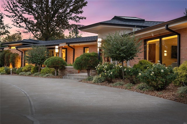view of front of property with brick siding