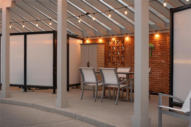 view of patio / terrace featuring outdoor dining area and a pergola
