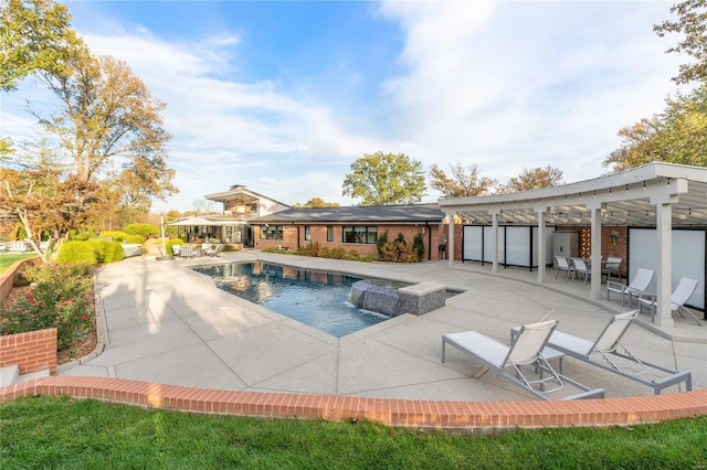 outdoor pool with a patio area