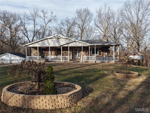 62812 Brown Ests, Hannibal, MO 63401 - view of front facade with a porch and a front lawn