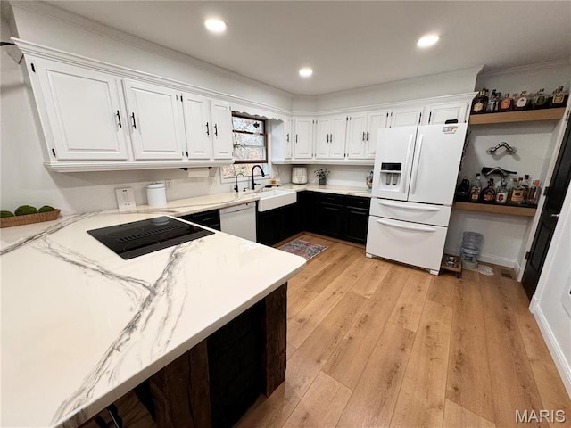 62812 Brown Ests, Hannibal, MO 63401 - kitchen with white appliances, a sink, white cabinets, light stone counters, and light wood finished floors