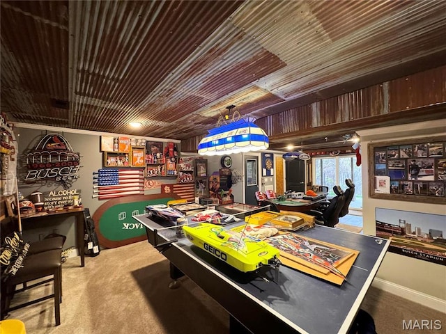 62812 Brown Ests, Hannibal, MO 63401 - playroom featuring carpet, baseboards, and wood ceiling