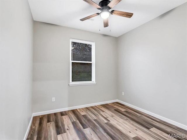 60 Cedar Brook Dr, Pacific, MO 63069 - spare room featuring wood finished floors and a ceiling fan