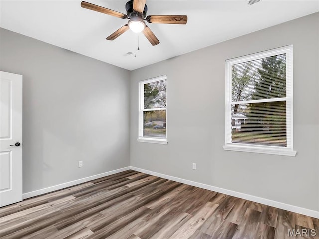 60 Cedar Brook Dr, Pacific, MO 63069 - spare room with wood finished floors and ceiling fan