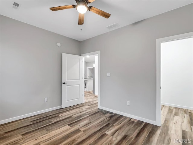 60 Cedar Brook Dr, Pacific, MO 63069 - unfurnished bedroom with wood finished floors and a ceiling fan