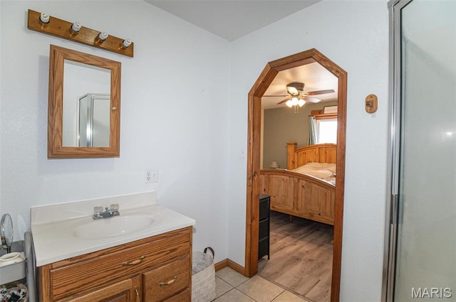 1106 W Parkview Dr, Belle, MO 65013 - ensuite bathroom featuring vanity, ceiling fan, and tile patterned floors
