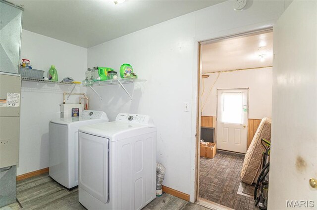 1106 W Parkview Dr, Belle, MO 65013 - washroom featuring independent washer and dryer and wood finished floors