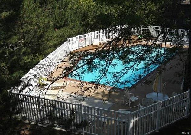 2314 Seven Pine Dr Unit 8, Saint Louis, MO 63146 - view of swimming pool featuring fence and a patio