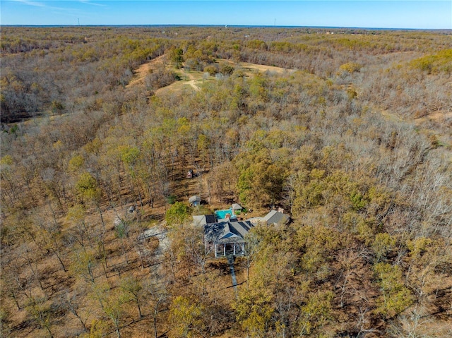 view from above of property featuring a forest