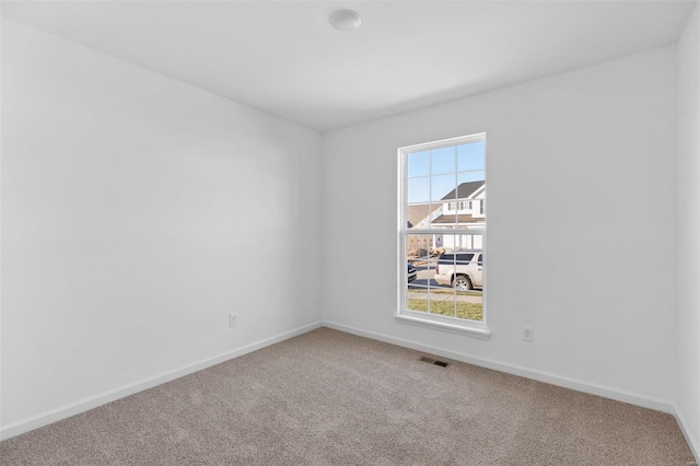 1064 Vardon Meadows Dr, Union, MO 63084 - spare room featuring carpet flooring and baseboards