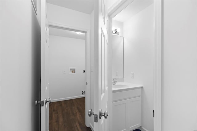 3139 White Pine Dr, Imperial, MO 63052 - bathroom with wood finished floors, vanity, and baseboards