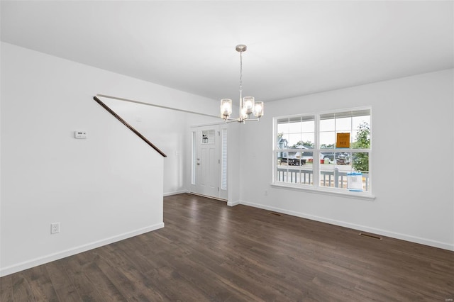 3139 White Pine Dr, Imperial, MO 63052 - unfurnished dining area featuring dark wood-style floors, a chandelier, baseboards, and stairs