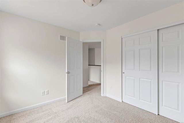3139 White Pine Dr, Imperial, MO 63052 - unfurnished bedroom featuring carpet flooring, baseboards, and a closet