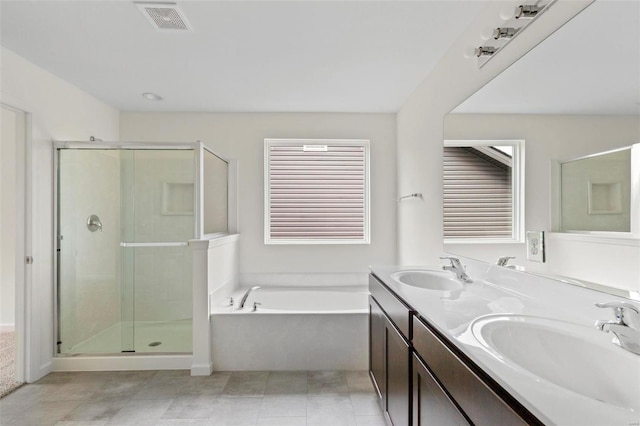 3139 White Pine Dr, Imperial, MO 63052 - bathroom with a shower stall, a bath, and double vanity
