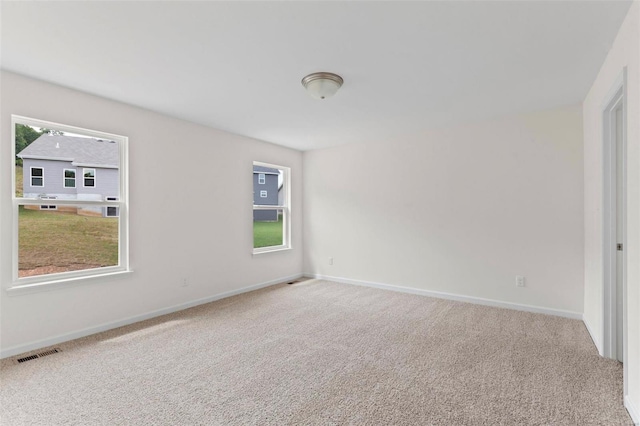 3139 White Pine Dr, Imperial, MO 63052 - spare room featuring carpet floors and baseboards