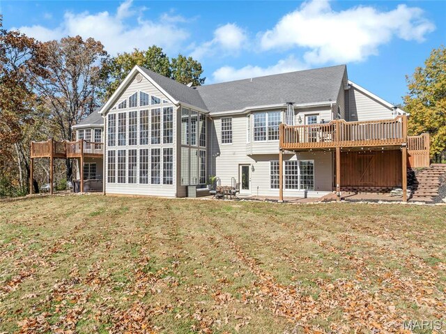 809 Peruque View Ct, Wentzville, MO 63385 - back of house with a deck, a sunroom, a patio area, and a lawn