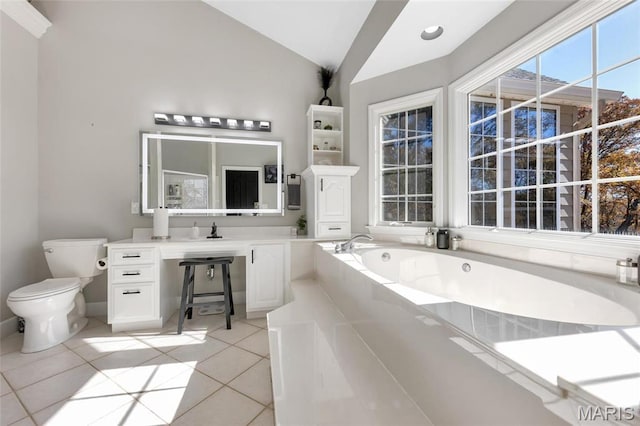 809 Peruque View Ct, Wentzville, MO 63385 - bathroom with toilet, lofted ceiling, a bath, tile patterned floors, and vanity