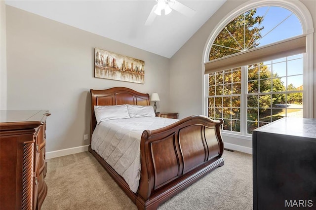 809 Peruque View Ct, Wentzville, MO 63385 - bedroom with light colored carpet, multiple windows, baseboards, high vaulted ceiling, and ceiling fan