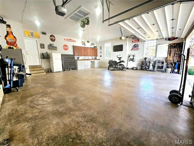 809 Peruque View Ct, Wentzville, MO 63385 - garage featuring a garage door opener