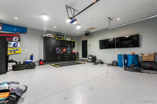 3723 Cabernet Ln, Edwardsville, IL 62025 - garage featuring a garage door opener and recessed lighting