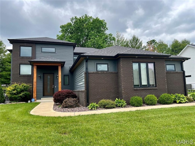 3723 Cabernet Ln, Edwardsville, IL 62025 - prairie-style house with brick siding and a front lawn