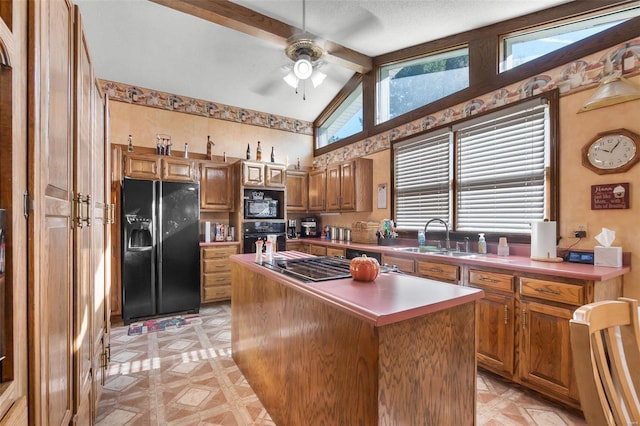 2230 Kent Dr, Cape Girardeau, MO 63701 - kitchen featuring black appliances, brown cabinetry, a sink, a ceiling fan, and beamed ceiling