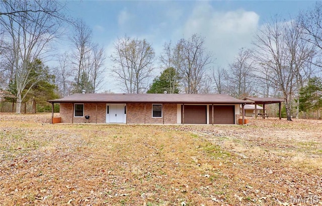 10994 Webster Rd, Caledonia, MO 63631 - view of front facade featuring an attached garage and brick siding