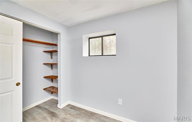 10994 Webster Rd, Caledonia, MO 63631 - unfurnished bedroom featuring wood finished floors and a closet