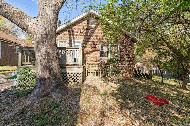 7510 Springdale Dr, Saint Louis, MO 63121 - view of yard with a wooden deck