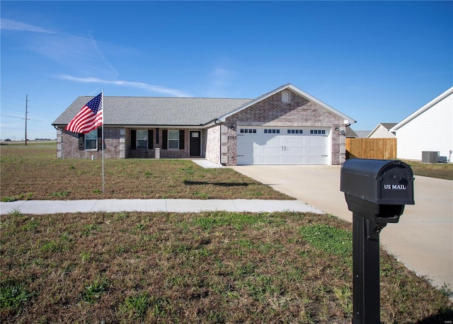single story home with a garage, driveway, brick siding, and cooling unit