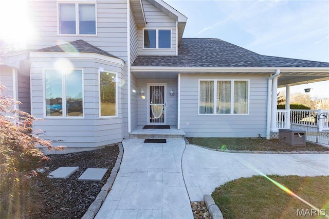 10605 Larson Ln, Rolla, MO 65401 - view of exterior entry featuring a shingled roof