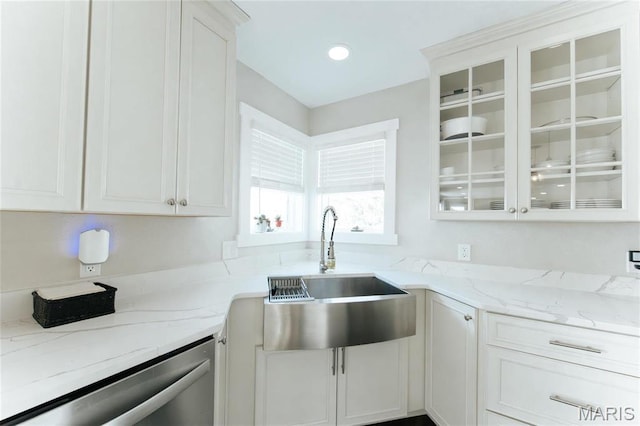 10605 Larson Ln, Rolla, MO 65401 - kitchen with stainless steel dishwasher, a sink, glass insert cabinets, white cabinetry, and light stone countertops