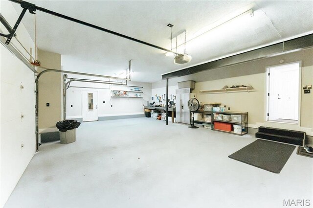 10605 Larson Ln, Rolla, MO 65401 - garage featuring a garage door opener